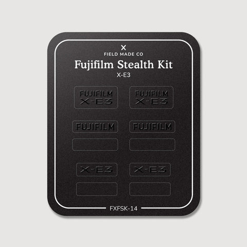 Stealth Kit for Fujifilm X-E3: Ghost Logo and Plain Black vinyl labels on the Field Made Co backing sheet