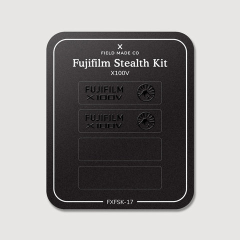 Stealth Kit for Fujifilm X100 V: Ghost Logo and Plain Black vinyl labels on the Field Made Co backing sheet