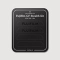 Stealth Kit for Fujifilm GFX 100 and 50S: Ghost Logo and Plain Black vinyl labels on the Field Made Co backing sheet
