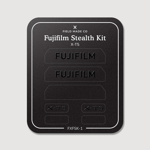 Stealth Kit for Fujifilm X-T5: Ghost Logo and Plain Black vinyl labels on the Field Made Co backing sheet